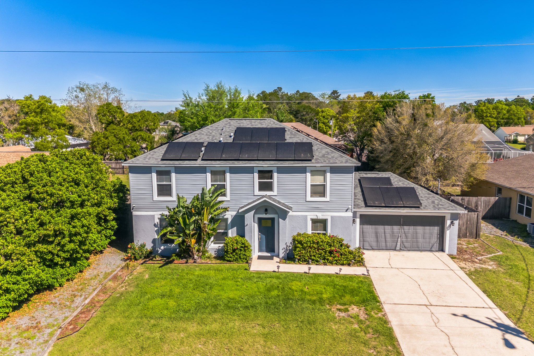 aerial view of house with solar panels